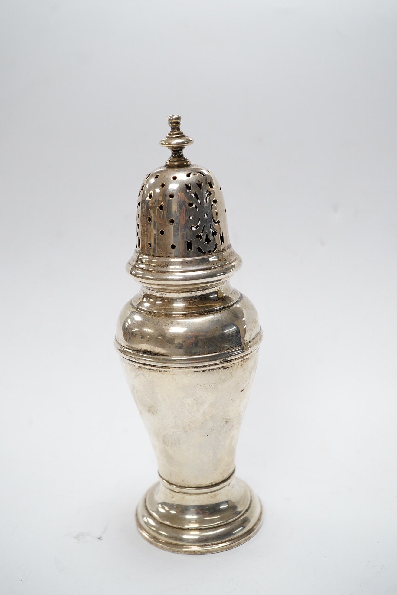 A George VI silver sugar caster, by William Comyns & Sons Ltd, London, 1936, 16.1cm, 5oz. Condition - fair